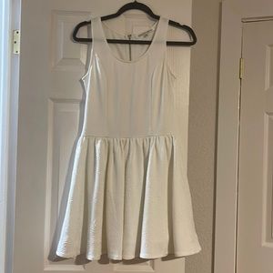 White sleeveless designer dress